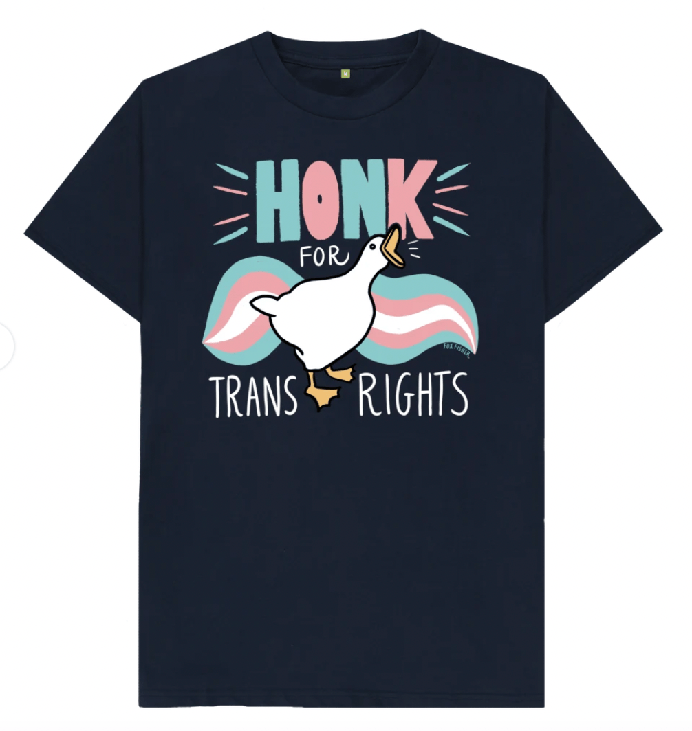 Navy organic cotton t-shirt laid flat with the Honk For Trans Rights goose print across the chest, the goose's wings drawn as pink, white and blue trans pride flag stripes.