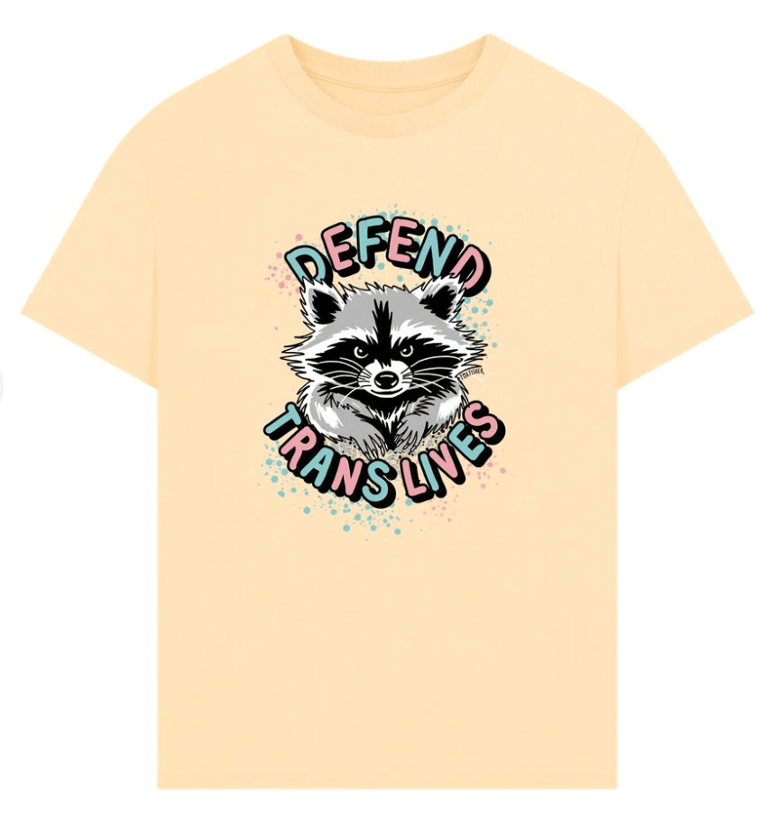 Peach apricot Defend Trans Lives oversized raccoon t-shirt by Fox Fisher, cute raccoon graphic on organic cotton unisex tee