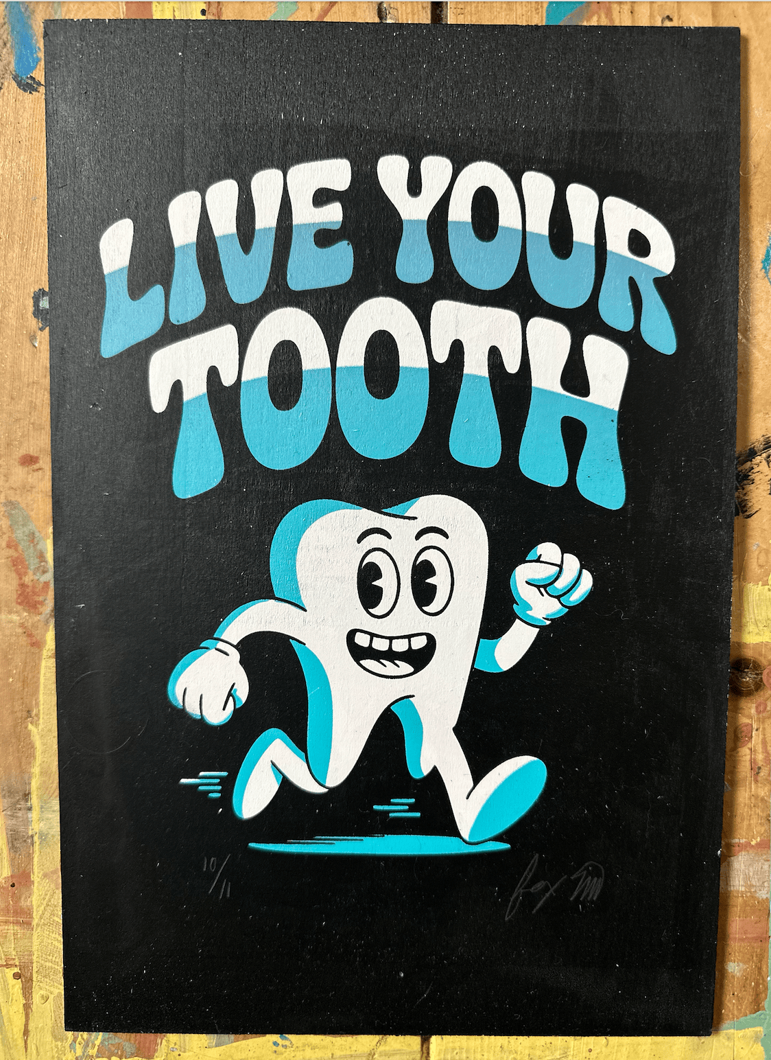 Live Your Truth edition 10/11 screen print on wood panel by Fox Fisher, cartoon tooth character with blue and teal lettering on black background, signed and numbered limited edition artwork