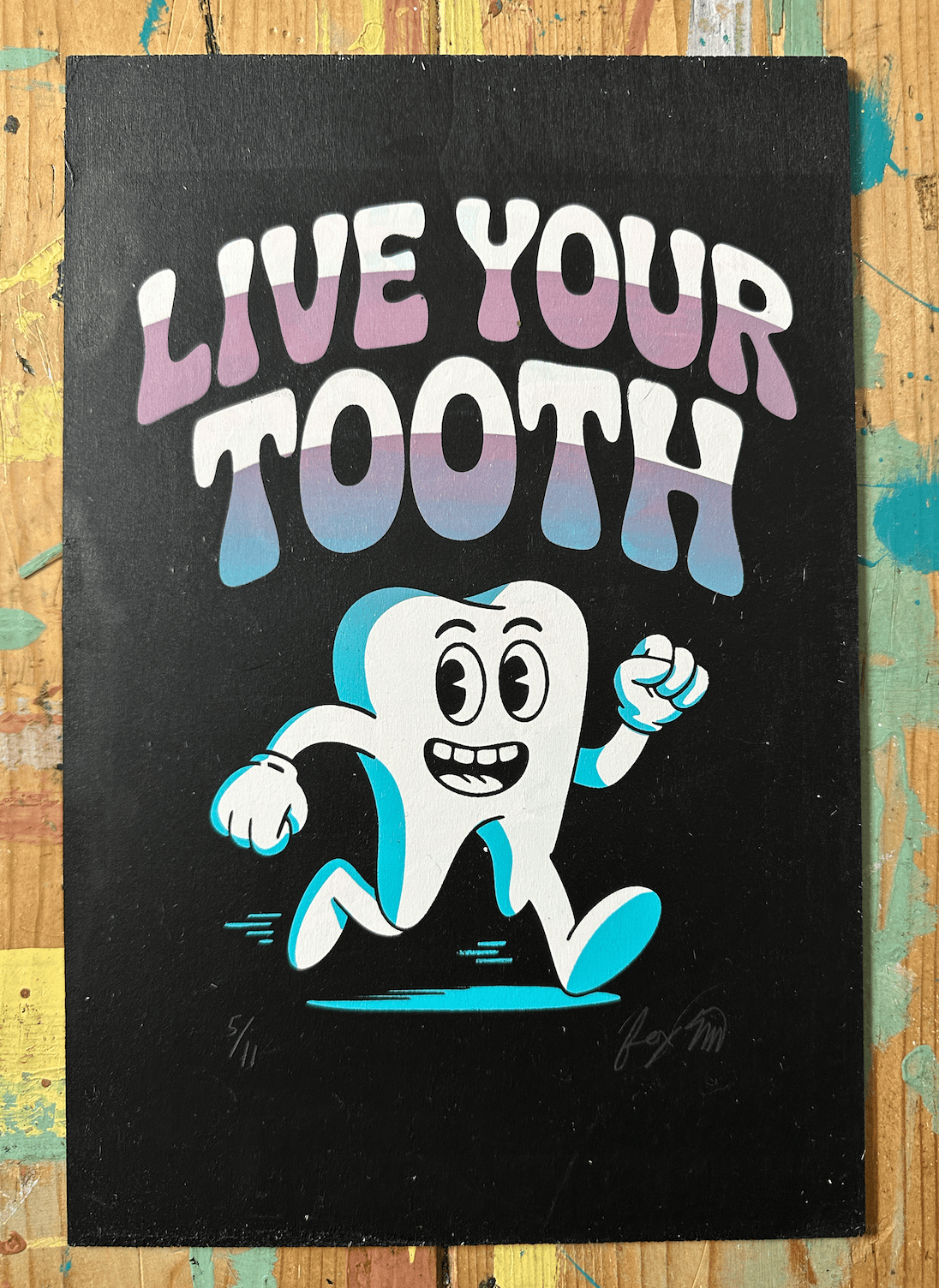 Live Your Truth edition 5/11 screen print on wood panel by Fox Fisher, cartoon tooth character with pink and lavender to blue gradient lettering on black background, signed and numbered limited edition artwork