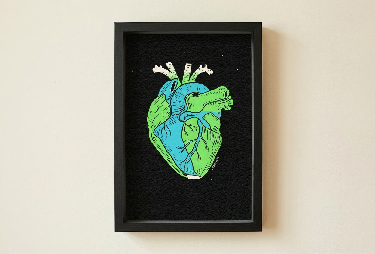 Earth Is A Heart Art Print by Fox Fisher - Framed anatomical heart earth illustration on a beige wall, vibrant green and blue eco art print